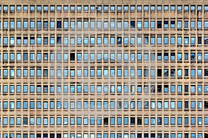 Repeated pattern of a high buidling facade with windows