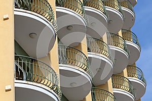 Repeating pattern of balcony. Bulding front