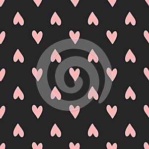 Repeating pink hearts on black background. Cute seamless pattern.