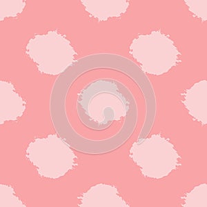 Repeating pink spots painted rough brush. Seamless pattern.
