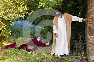 Touching Jesus robe photo