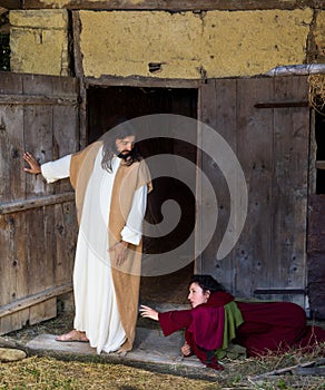 Woman asking Jesus for forgiveness photo
