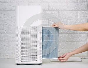 Replace the air purifier filter the house