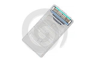 Replacement cassette with razor blades on white background, isolated. Shaving and hygiene. Background with copy space