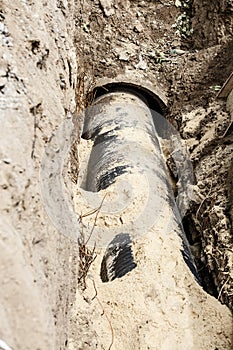 Replacement of a sewer pipe deep under the ground