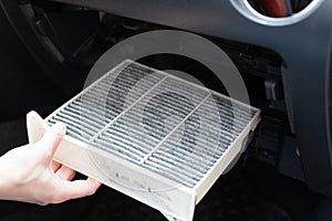 Replacing the ar cabin filter the car. Replacing New Air filter