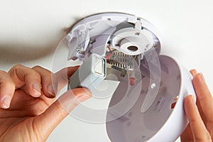 Replacing Battery In Domestic Smoke Alarm photo