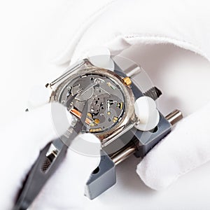 Replacing battery in quartz wristwatch close up