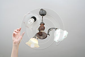 Replacing blown out light bulb photo