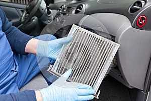 Replacing dirty cabin pollen air filter for a car