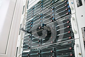 Replacing a module in a powerful server hardware. Cloud storage technology concept. Hosting platform of the Internet provider.