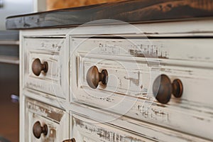 replacing old knobs on upcycled kitchen cabinets