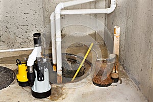 Replacing the old sump pump in a basement