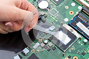 Replacing thermal paste on a laptop.