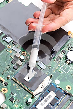 Replacing thermal paste on a laptop.