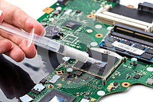 Replacing thermal paste on a laptop.