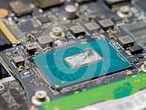 Replacing thermal paste on a laptop.