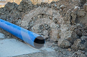 Replacing water pipes. pipes lie on the ground