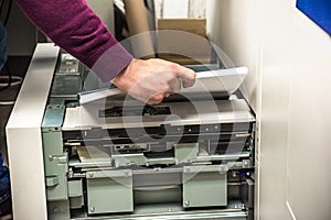 Replenishing paper in a digital printer