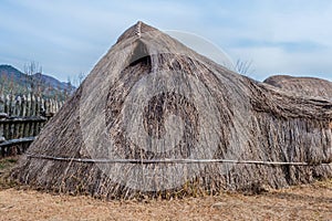 Replica of straw hut in neolithic park