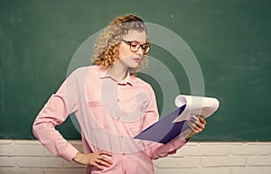 report project. back to school. essay writing. teacher with document folder. reading student in glasses at blackboard