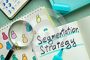 Report about segmentation strategy and magnifying glass. photo