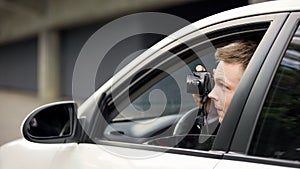 Reporter secretly taking photo sitting in auto, spying paparazzi, exclusive