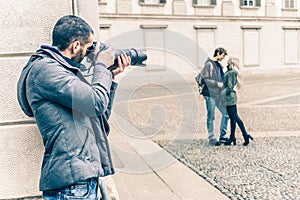 Reporter spying a couple