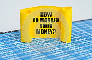 On reporting documents, a yellow paper plate with the inscription - How to manage your money