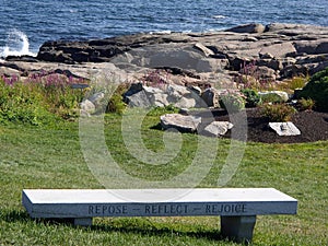 Repose, Reflect, rejoice, cement bench at Nubble Lighthouse, Ogunquit, Maine