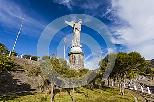 Representation of the winged Virgin on top of the hill Panecillo photo