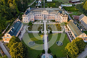 Representative pink rococo Nove Hrady castle from 1777, french garden, village near Litomysl, Pardubice region, Czech republic.