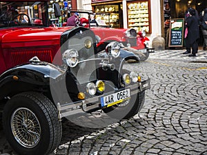 Reproduction vintage car taking tourists around the city of Prague