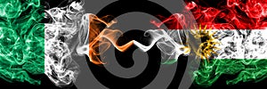 Republic of Ireland, Irish vs Kurdistan, Kurdish, Kurds smoky mystic flags placed side by side. Thick colored silky abstract smoke