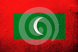 The Republic of Maldives National flag. Grunge background