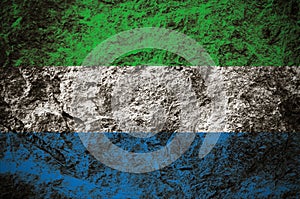 Republic of Sierra Leone flag on stone background