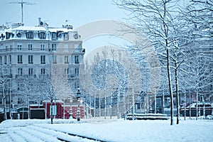 Republic square and street in Paris under snow