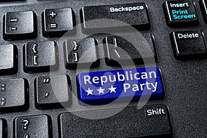 Republican Party blue key on a decktop pc keyboard. United States elections and politics concepts. Voting online for Republican photo