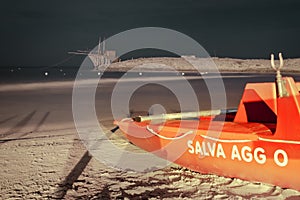 The rescue boat on the beach at night