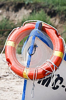 Rescue boat with lifebuoy