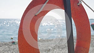 Rescue buoy on the beach. Lifebuoy.