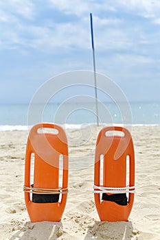 Rescue buoys on a quiet beach