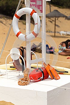 Rescue equipment on the beach: lifeline, flippers, rope and more.