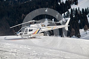A rescue helicopter of the mountain rescue service in the Dolomites