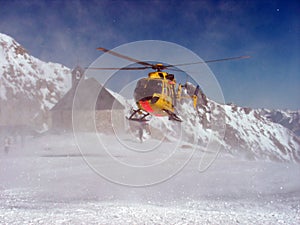 Rescue helicopter in the mountains