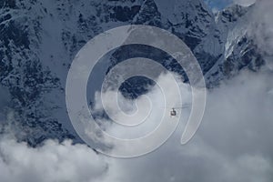 Rescue helicopter over big clouds, Gorak Shep, Everest Base Camp trek, Nepal