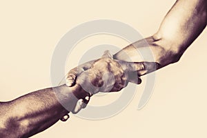Rescue, helping gesture or hands. Helping hand concept, support. Helping hand outstretched, isolated arm, salvation photo