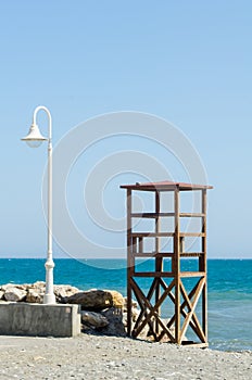 rescue hut on a sandy beach, safe relax by the ocean, a beautiful sunny day