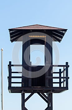 rescue hut on a sandy beach, safe relax by the ocean, a beautiful sunny day