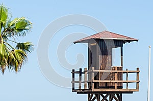 rescue hut on a sandy beach, safe relax by the ocean, a beautiful sunny day
